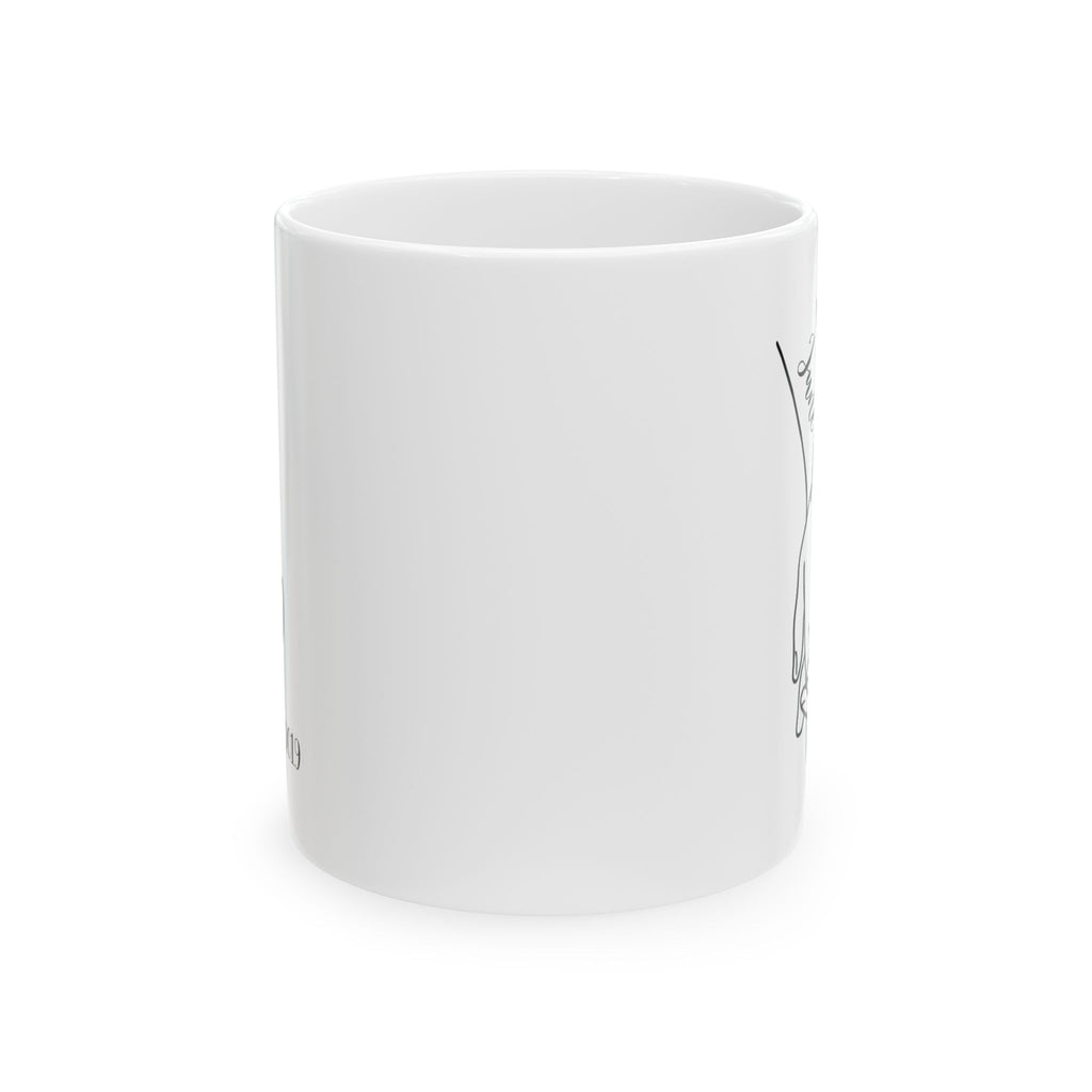 Personalized couple hands mug shown on a table as an anniversary gift