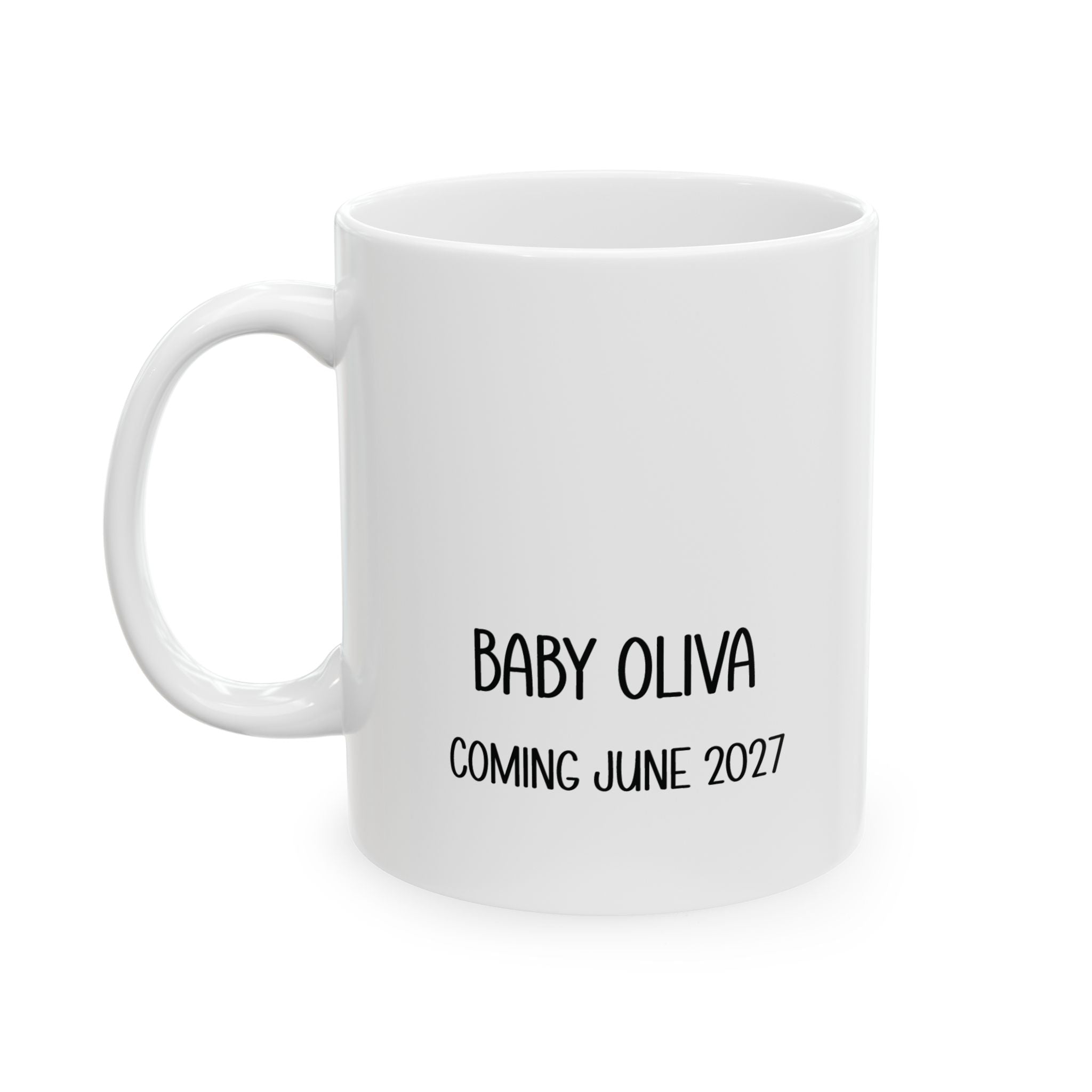 Personalized sonogram photo baby announcement mug displayed on a desk