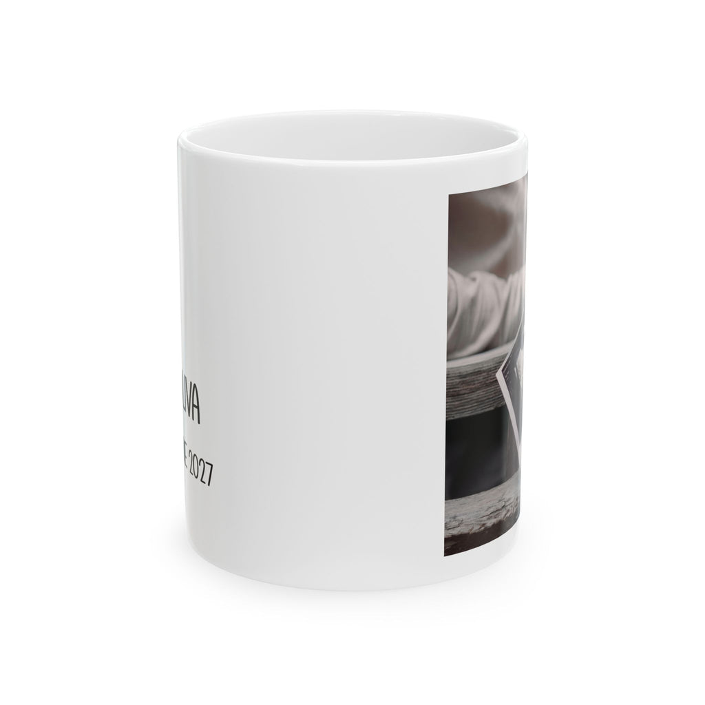 Personalized sonogram photo baby announcement mug held in hand