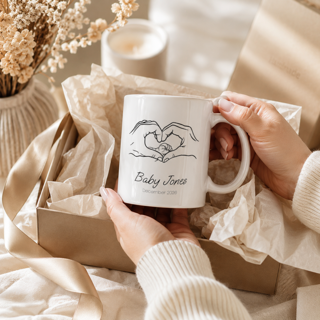 Personalized heart hands baby announcement mug shown as a baby shower gift for new parents