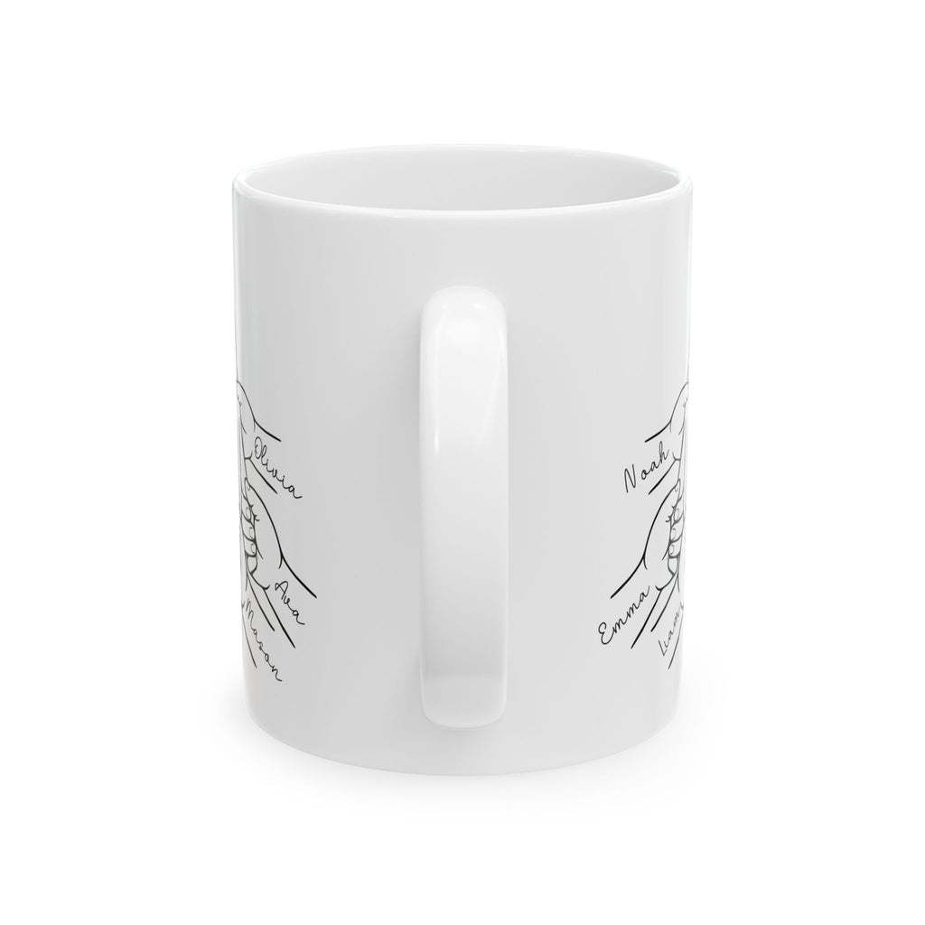 Personalized family hands mug shown on a table as a birthday gift
