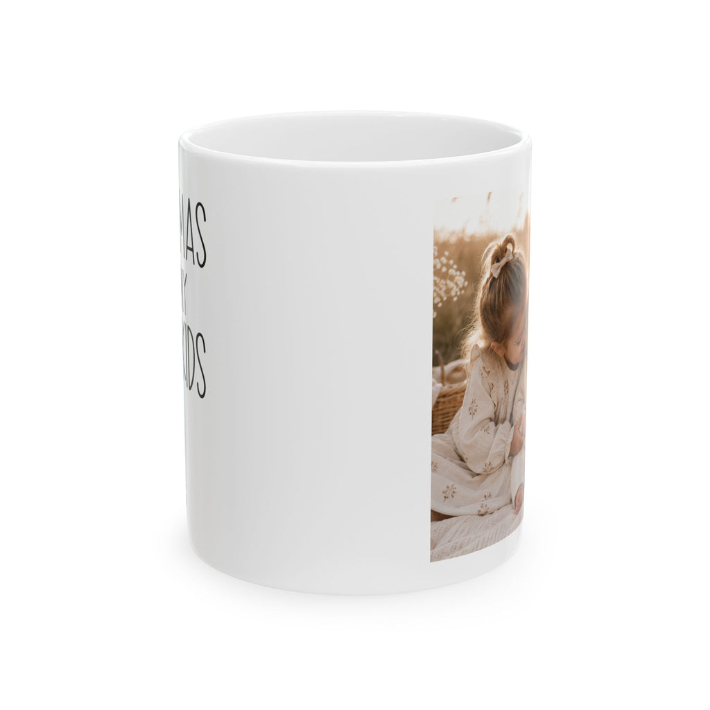Personalized Christmas with grandkids photo mug held in hand