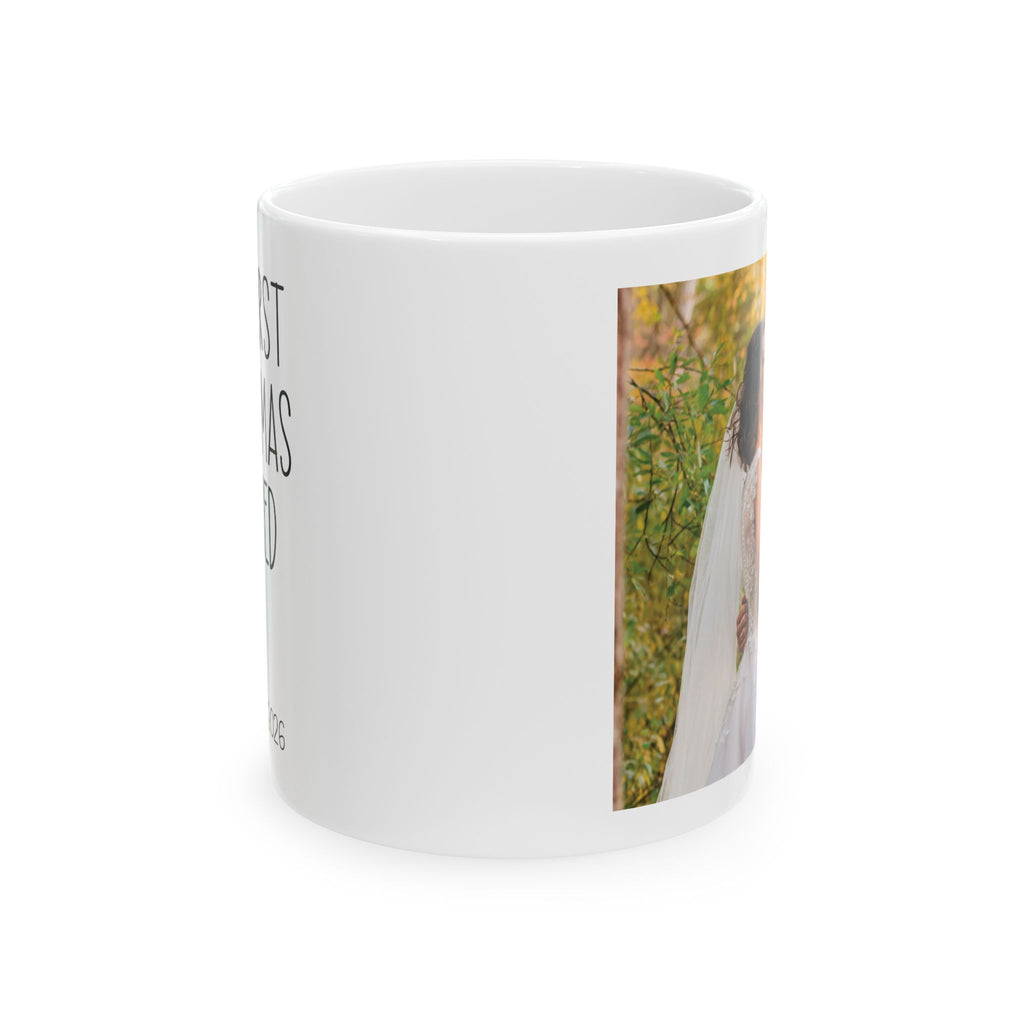 Personalized first Christmas married photo mug held in hand