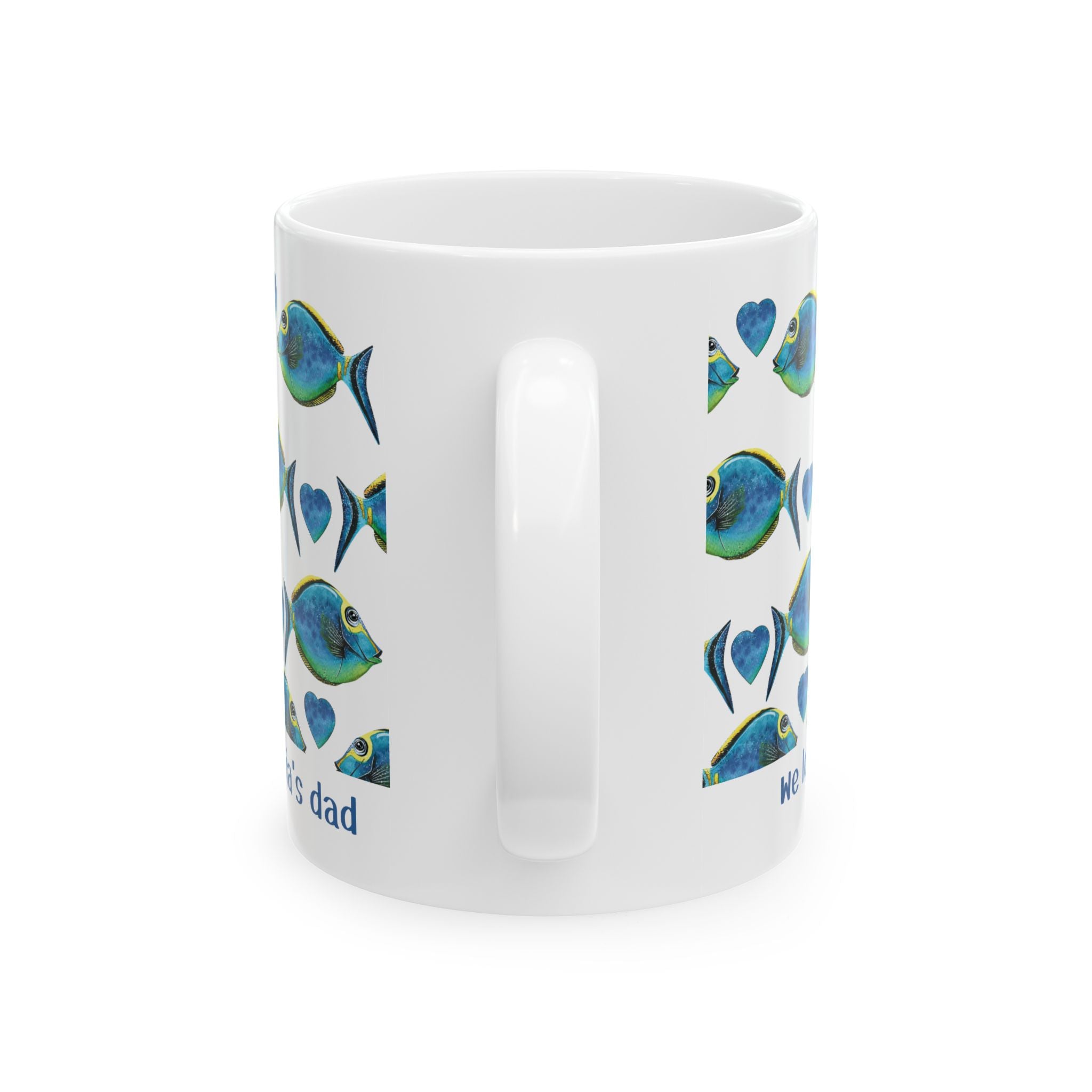 Personalized fish pattern we love you mug shown on a table as a Father's Day gift
