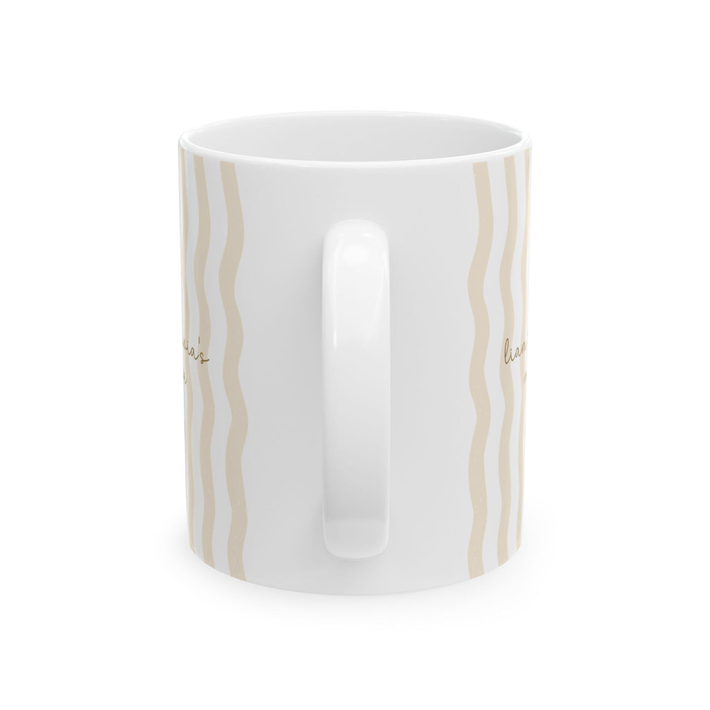 Personalized wavy stripe kids names mug held in hand