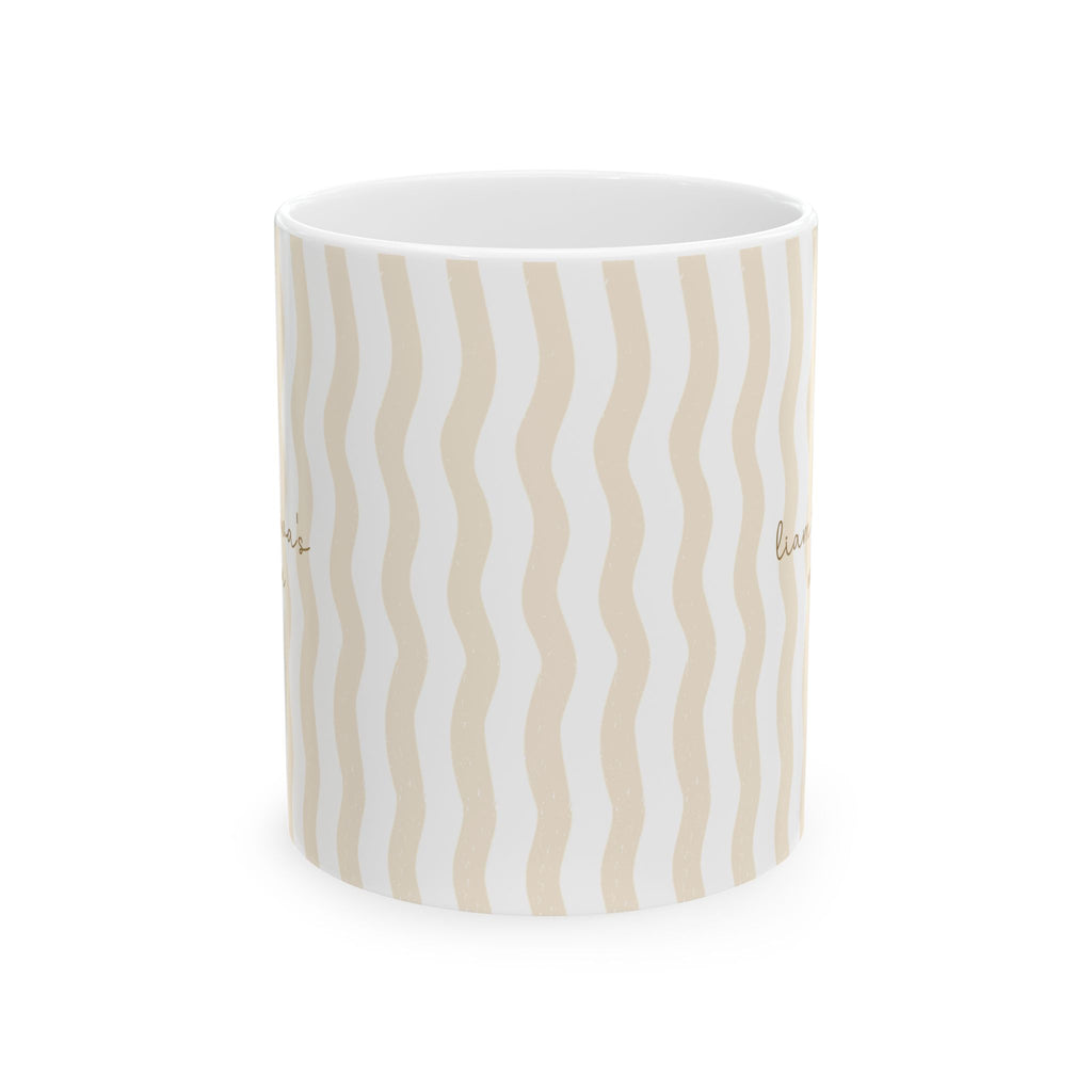 Personalized wavy stripe kids names mug shown on a table as a birthday gift